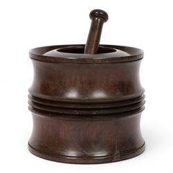 18th century lignum vitae captive mortar and pestle, the mortar of turned waisted form wit...