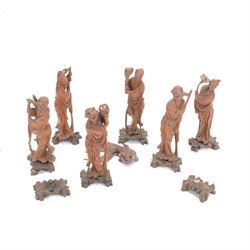 Collection of Chinese carving including a Shubunkin and various immortals 