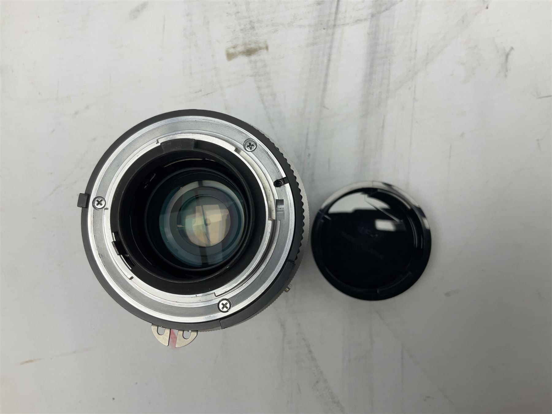 Nikon F3 SLR camera, serial number 1583609; Nikon 50mm 1:1.8 lens; Nikon 28-85mm 1:3.5-4.5 zoom lens; Vivitar MC 2X-3 Tele Converter, and a Nikon Speedlight SB-16 flash