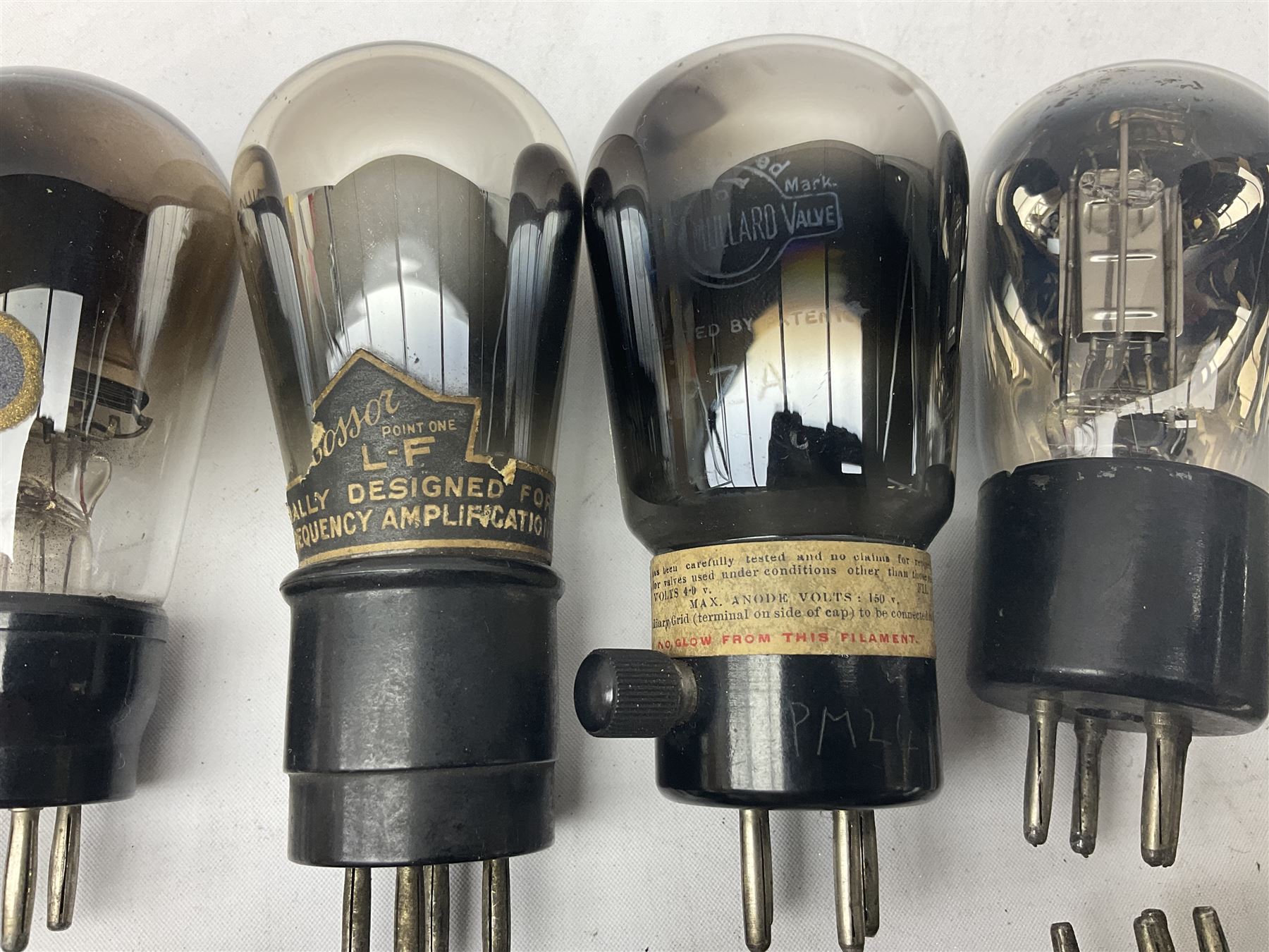 Eleven vintage radio valves, makes include Cossor, Osram, Philips etc. Including one small X-Ray tube.