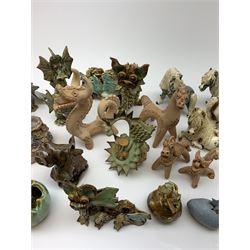 Four Cheval Ceramics figures modelled as ponies, together with a number of studio pottery figures of dragons. 