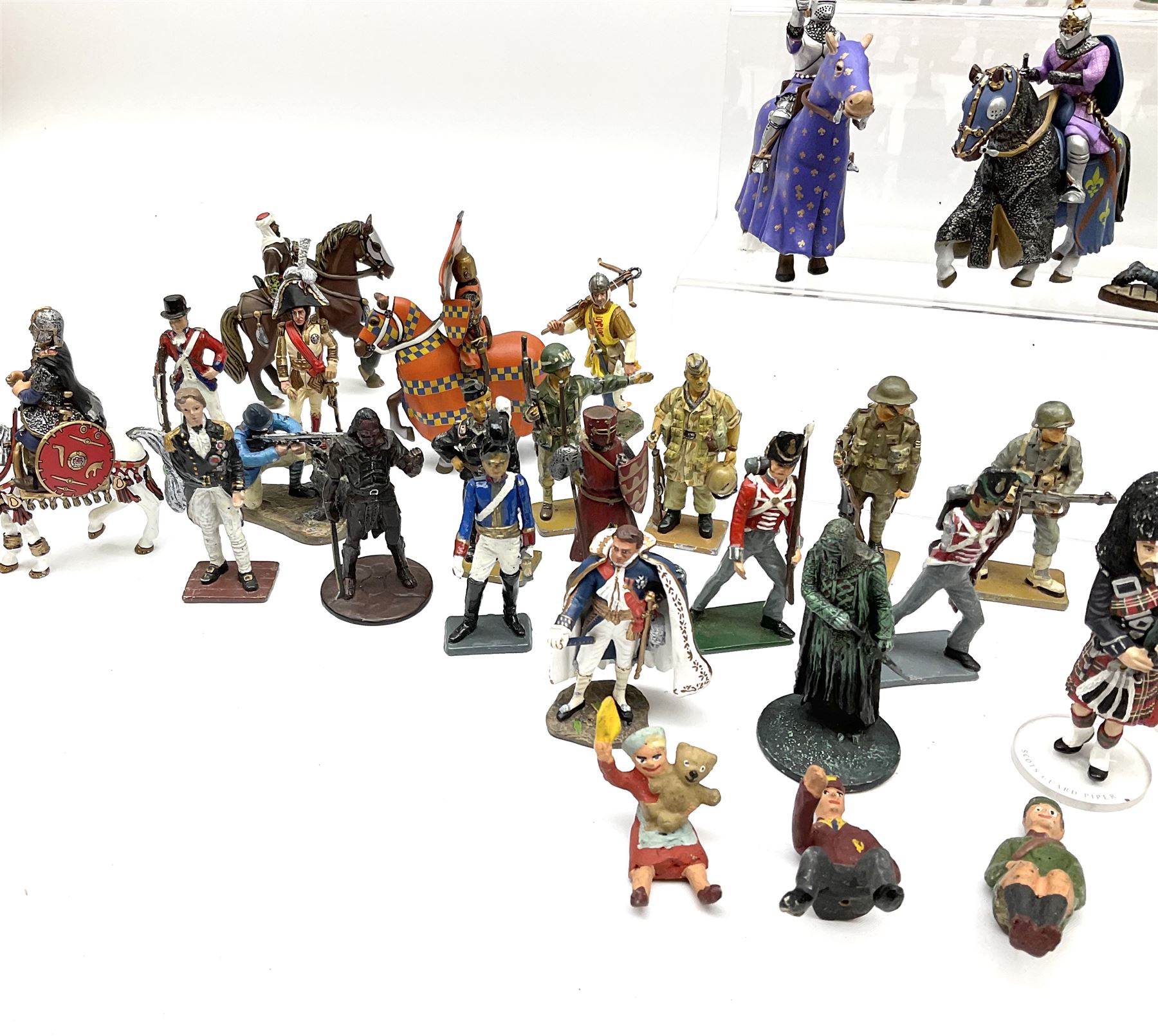 Over seventy cast metal figures by Del Prado, Corgi Icon, NLP etc including Napoleonic War, WW1 and WW2, knights on horseback and other mounted figures etc; all unboxed