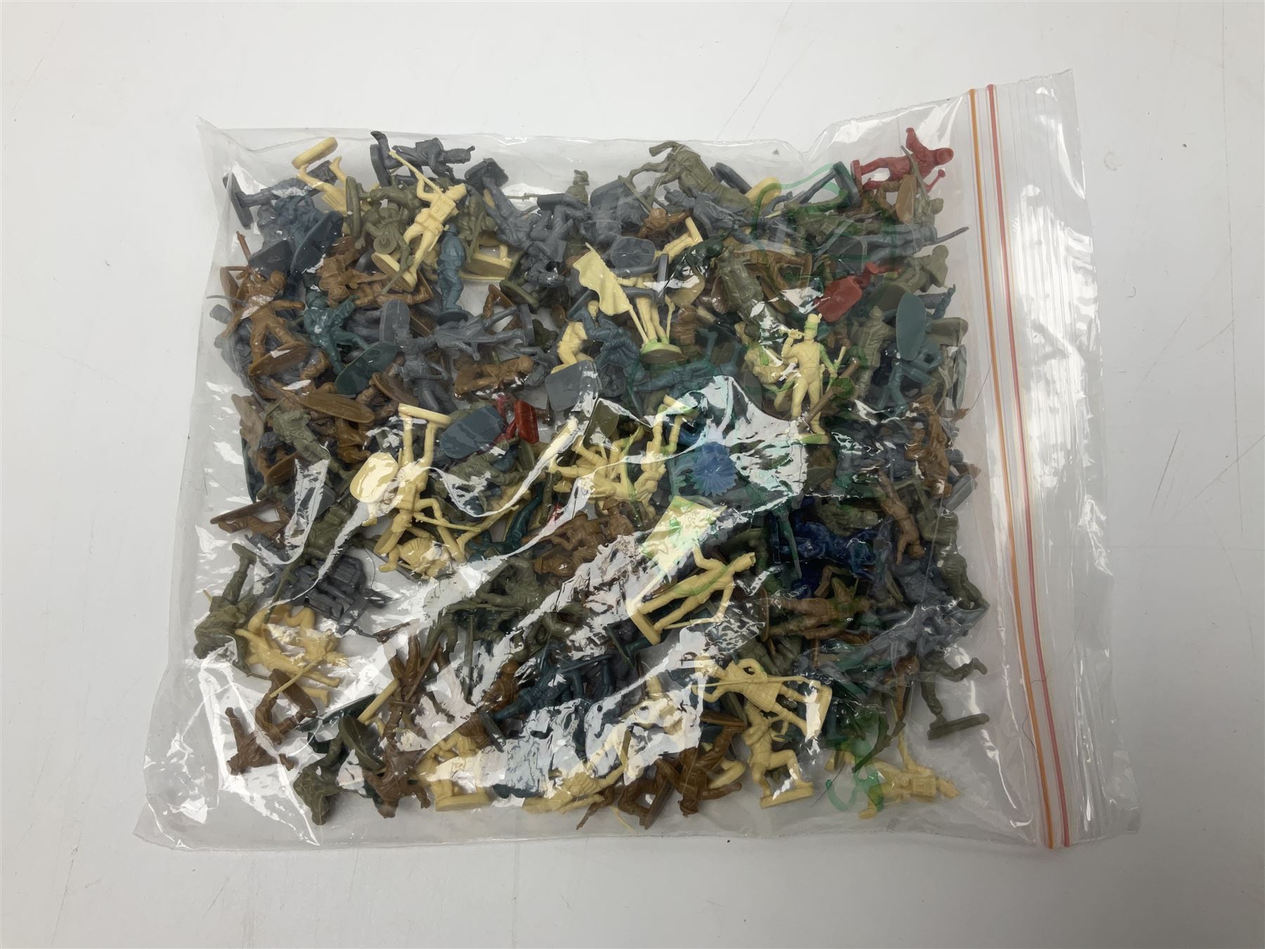 Ten 1980s Action Man Action Force figures with six original card backs; over three-hundred and forty Airfix large scale plastic soldiers; over two-hundred and thirty small scale plastic soldiers; together with accessories including boats, ladder etc