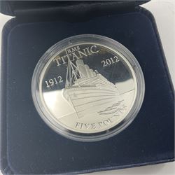 Queen Elizabeth II Bailiwick of Jersey 2011 'A Tribute to the Armed Services' silver proof five pound coin set and 2012 'R.M.S. Titanic Centenary' silver proof five pound coin, both cased with certificates