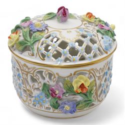 Early 20th century French porcelain tray, hand painted with dancing cherubs, within a pink and gilt border, inscribed 476 beneath, L25.5cm, pair of continental cherub figures, with blue anchor marks beneath, together with a Dresden porcelain pot pourri and cover, with pierced and floral decoration (4)