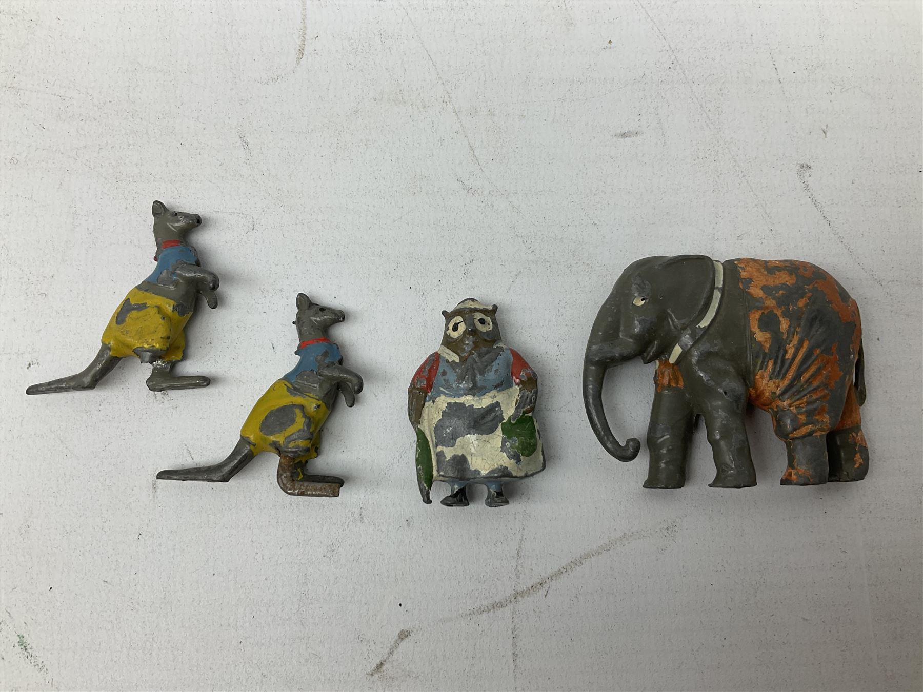 Collection of twenty-two Britains Cadbury's Cococubs play worn lead painted figures to include Mr Pie Porker, Mrs Pie Porker, Tiny Tusks, Captain Kangaroo, Granny Owl and others, Britains Snow White and Doc lead figures and other painted lead figures (30)