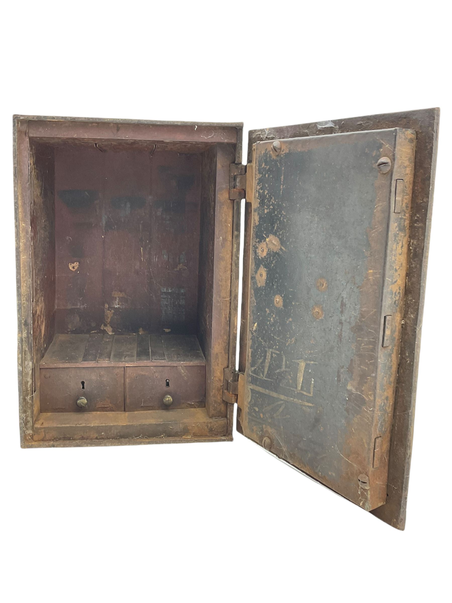Early 19th century cast iron safe strong box, with key, two internal drawers