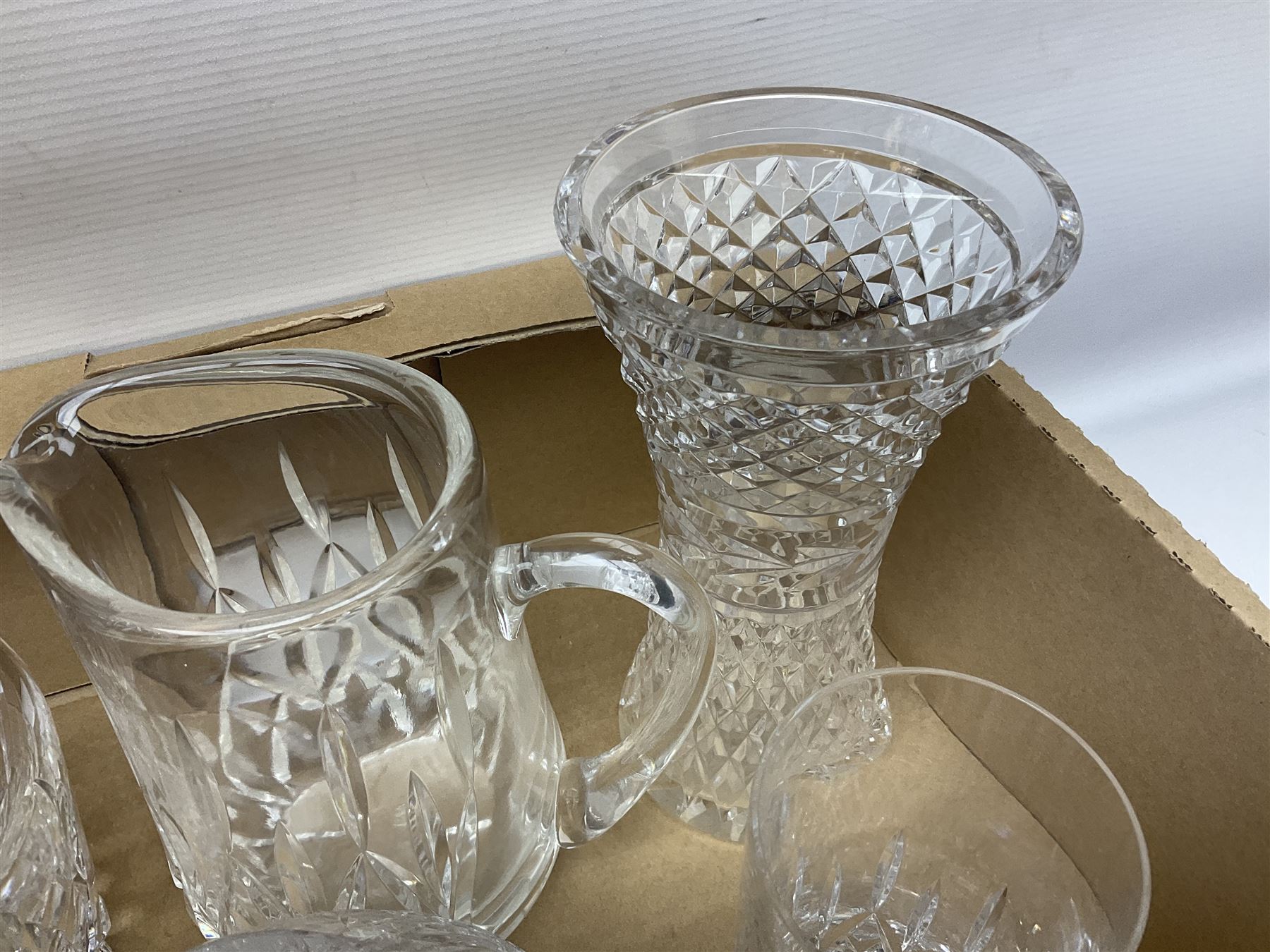 Collection of Waterford and Tyrone crystal, including wine glasses, clock, bowl, etc, together with a collection of other cut glass and crystal
