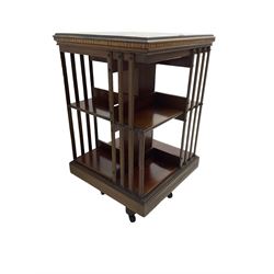 Maple & Co. London - Edwardian mahogany inlaid revolving bookcase, moulded square top with inlaid circular fan motif and satinwood banding, with circular label
