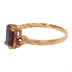 Gold coral and pearl ring and a gold three stone garnet ring, both hallmarked 9ct