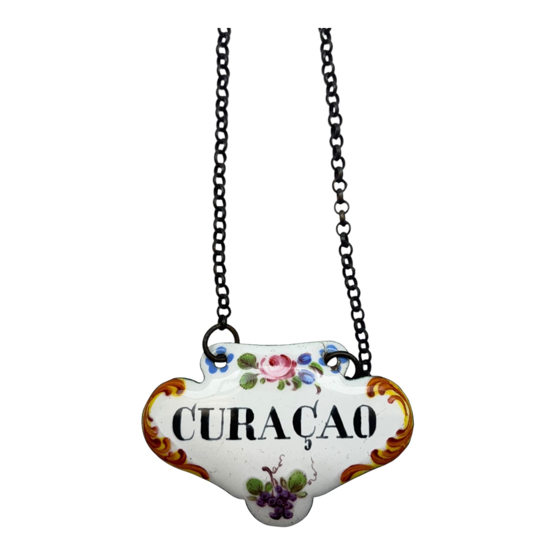 Seventeen mid 18th century and later enamel wine labels, one example of heart shaped form, the rest of cartouche and escutcheon form, various titles including Claret, Rum, Sloe Gin, Port, Whisky, Cowslip, Cherry-Brandy, etc., largest example W7cm 