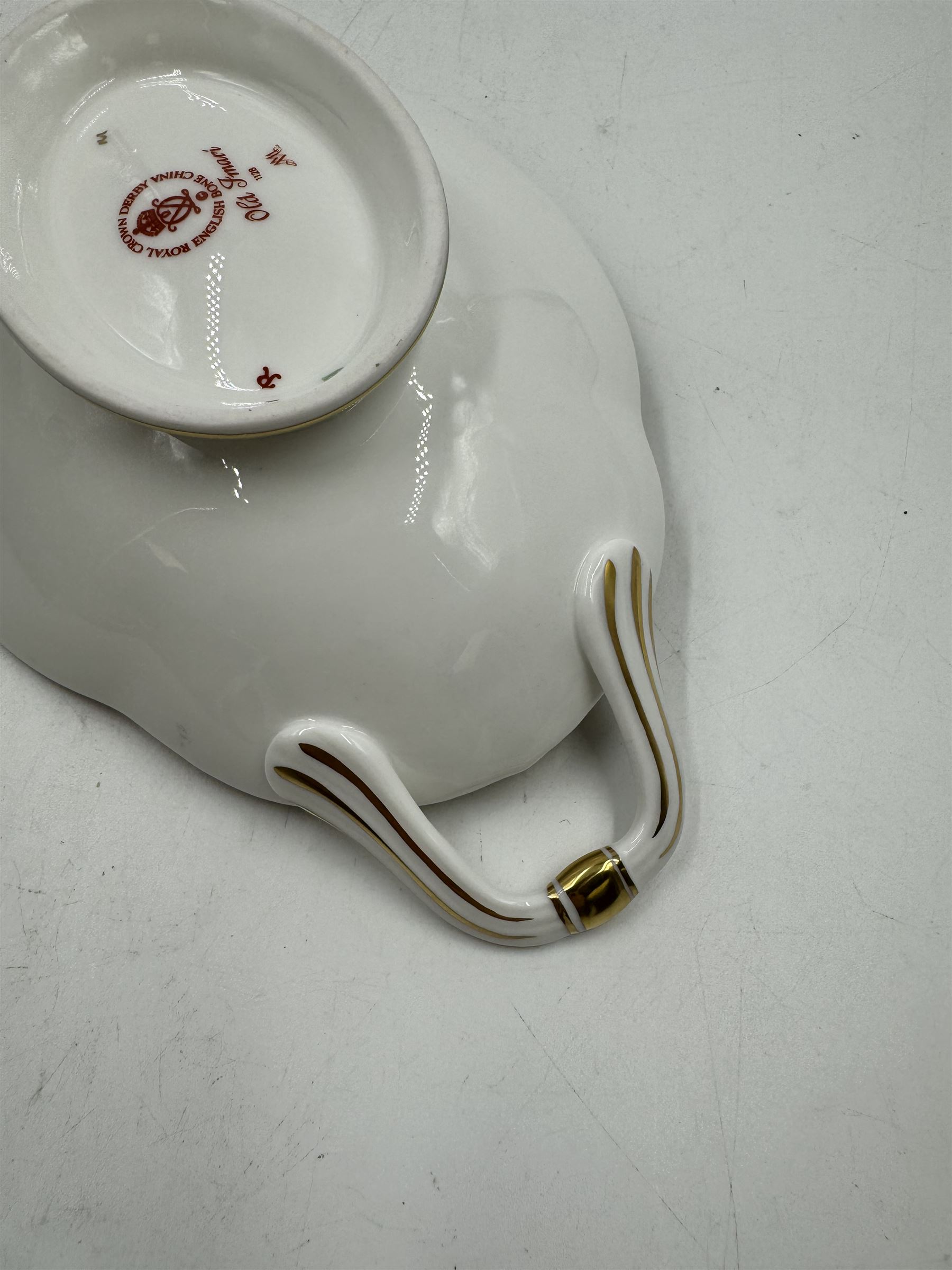 Royal Crown Derby Old Imari pattern 1128 twin handled sweetmeat dish, upon an oval pedestal, with printed mark beneath, H4.5cm, including handles W22.5cm 