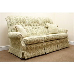  Three seat sofa, upholstered in a light green fabric with floral pattern (W180cm) a pair matching armchairs (W85cm) and footstool (4)  