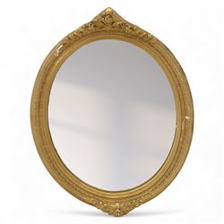 20th century gilt and composition framed wall mirrors, comprising a Rococo revival rectangular mirror with pierced scrolling acanthus and C-scroll cast border enclosing a plain plate (H 65cm, W 40cm), an oval neoclassical mirror with beaded frame, laurel crestings and trailing foliate sprays (H 57cm, W 45cm), a rectangular mirror with simulated marble effect side panels and foliate cast outer border (H 60cm, W 75cm), and a rectangular mirror with reeded and foliate moulded frame surrounding an oval aperture and plain plate (H 86cm, W 56cm)