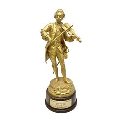 After Émile Bruchon, Mozart, gold painted figure upon a wooden plinth, H51cm