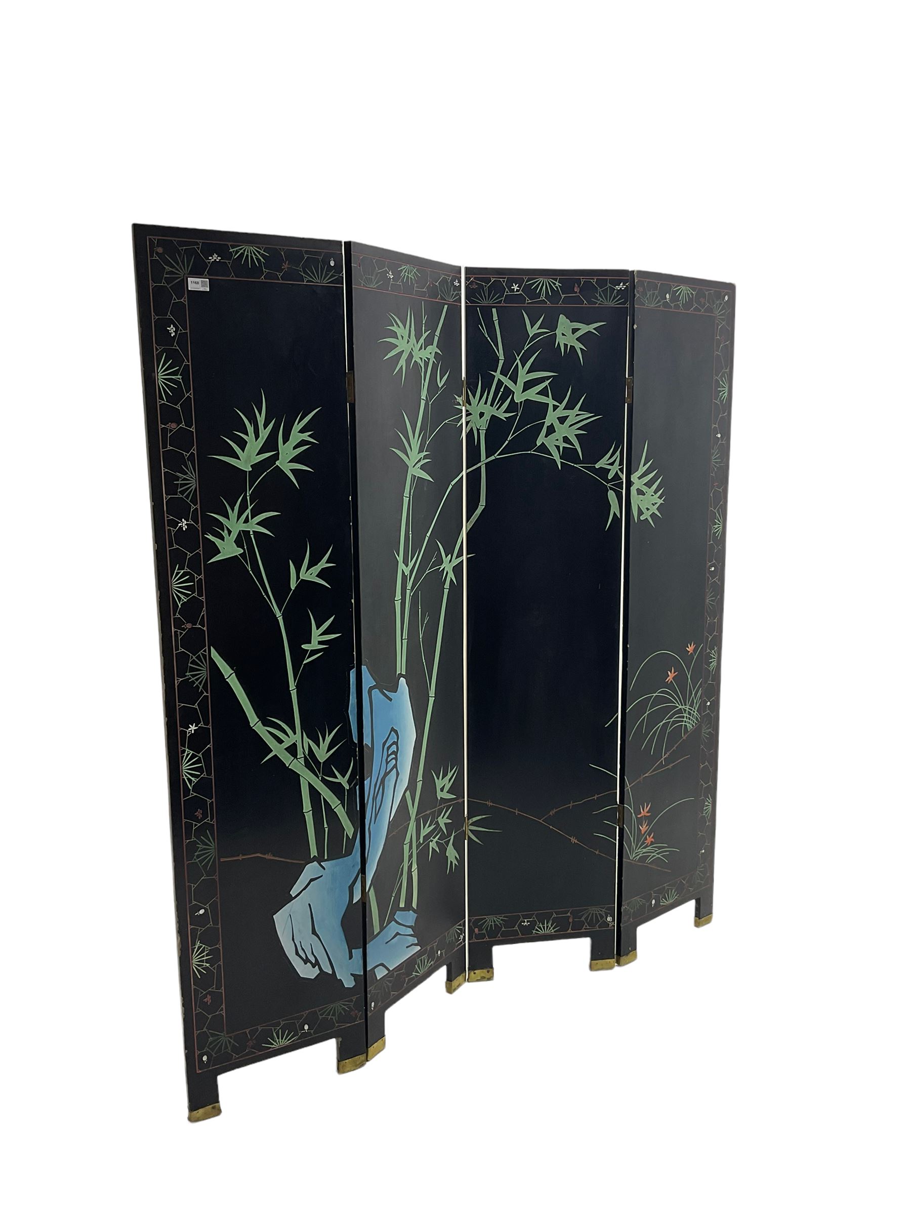 Chinese four panel folding screen, black lacquered with painted decoration