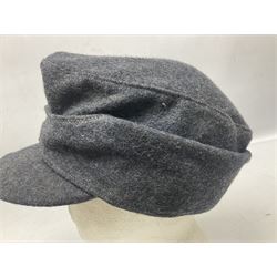 WW2 German Luftwaffe M43 field cap with triangular cloth eagle and roundel badge; marked '1944 ?/0501/0015 57'