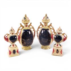 Pair of Royal Vienna twin handle vases with covers the central panel with shepherdesses together with another pair 