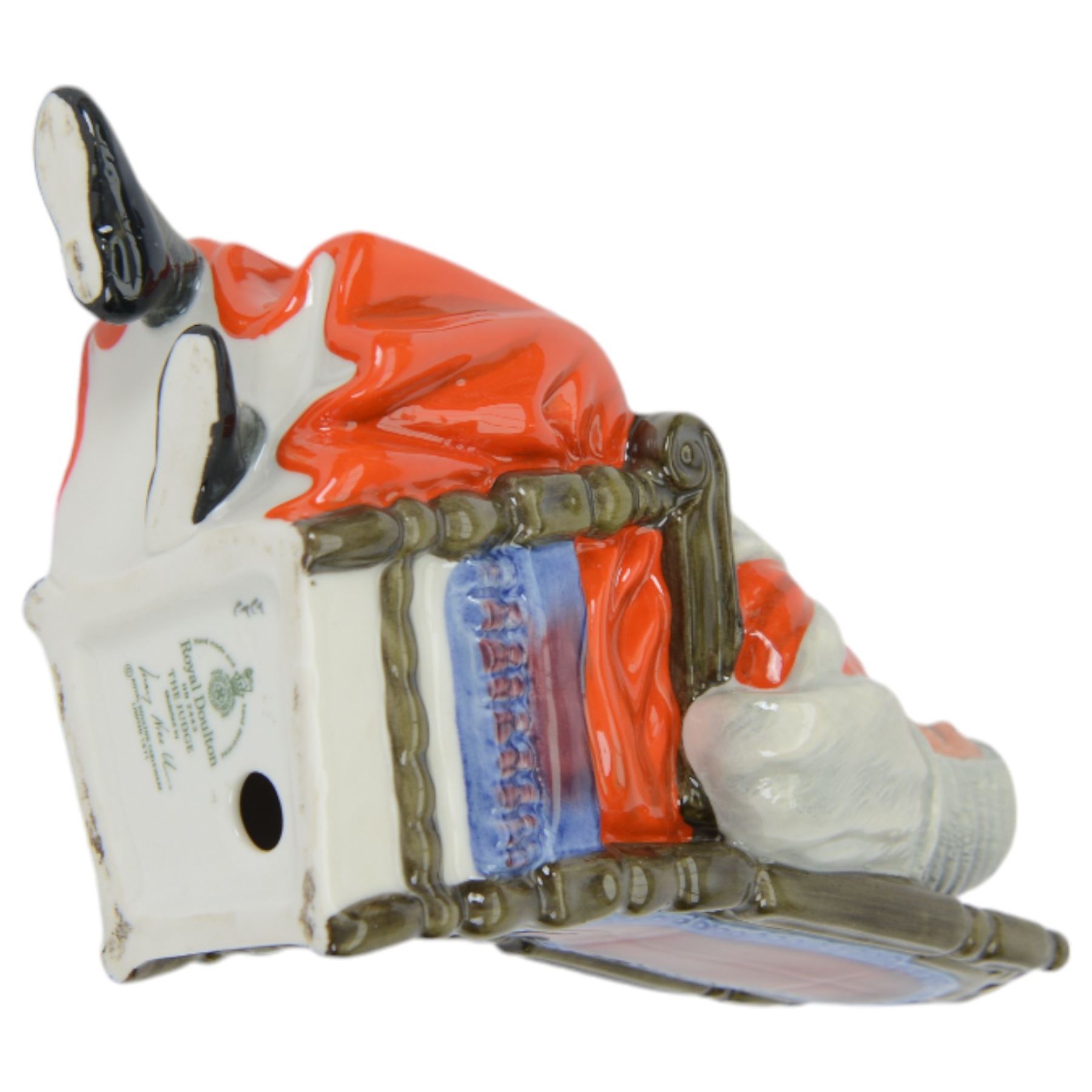 Four Royal Doulton figures, comprising The Judge HN2443, The Lawyer HN3041, Punch and Judy Man HN2765 and HN2016 