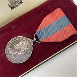 Two Imperial Service Medals to Elsie Hannah Ferguson and Fred Whitehead; each in original case; WWI Special Constabulary Medal to Inspr. Alfred W. Thompson; modern Prisoner of War Medal; cased; replica Victoria Cross and India Mutiny Medals with archive of information relating to Pte. Robert Newell V.C. 9th Lancers; replica Victoria Cross and George Cross with miniatures; and other replica medals etc