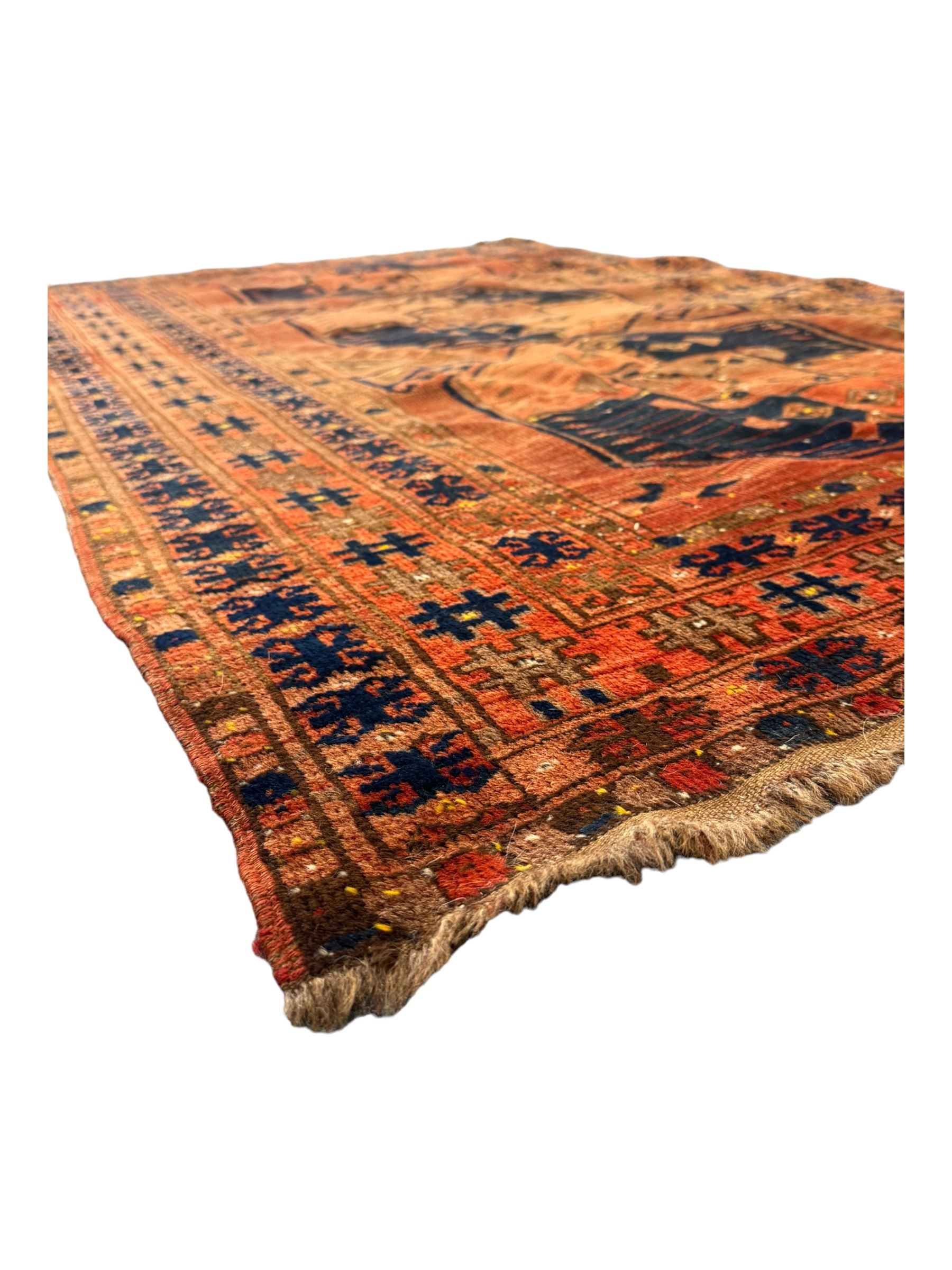 Turkish Kilim ground rug, the field with alternating horizontal bands of geometric patterns, bordered by repeating diamond motifs (145cm x 242cm); Turkish red ground rug, the field with three octagonal medallions (113cm x 172cm) (2)