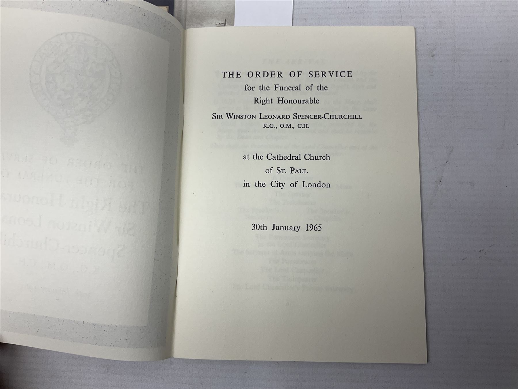 Disbound WW2 album relating to the battleship HMS King George VI containing over fifty various size loose photographs of the ship in action, guns firing, crew members, aircraft, two of George VI on board, three of Winston Churchill on board, official 1942 Christmas messages including Franklin Roosevelt etc; together with unrelated printed letter on 10 Downing Street notepaper from Winston Churchill; and Order of Service for Churchill's funeral at St. Paul's Cathedral 30th January 1965