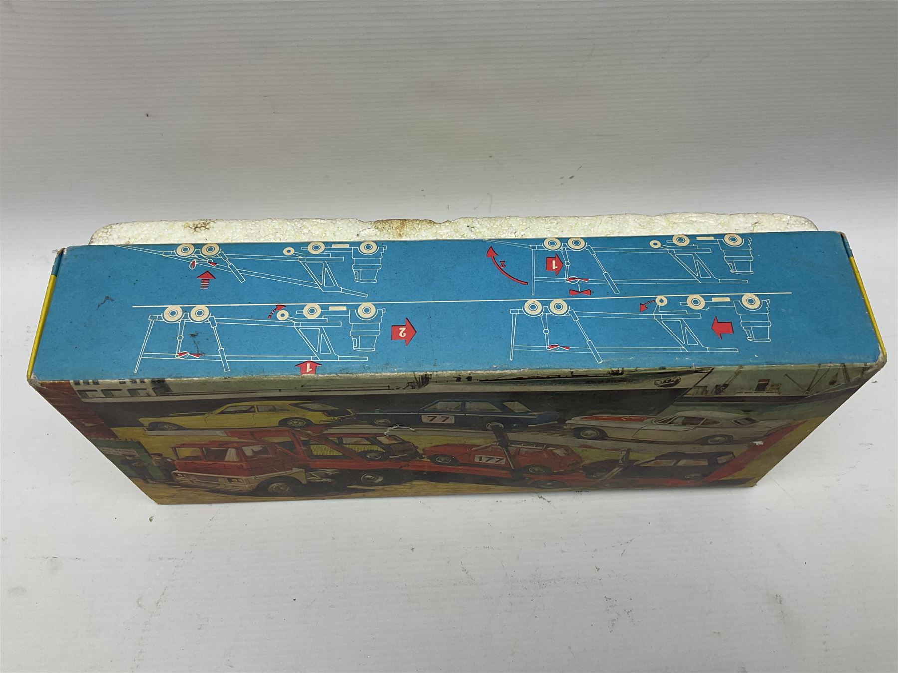 Corgi - Gift Set no.41 comprising Carrimore Mark Iv Transporter, Morris Mini-Cooper, BMC Mini-Cooper S, Morris Mini-Minor, Volvo P.1800 and Sunbeam IMP; missing MGC GT car; in original box 