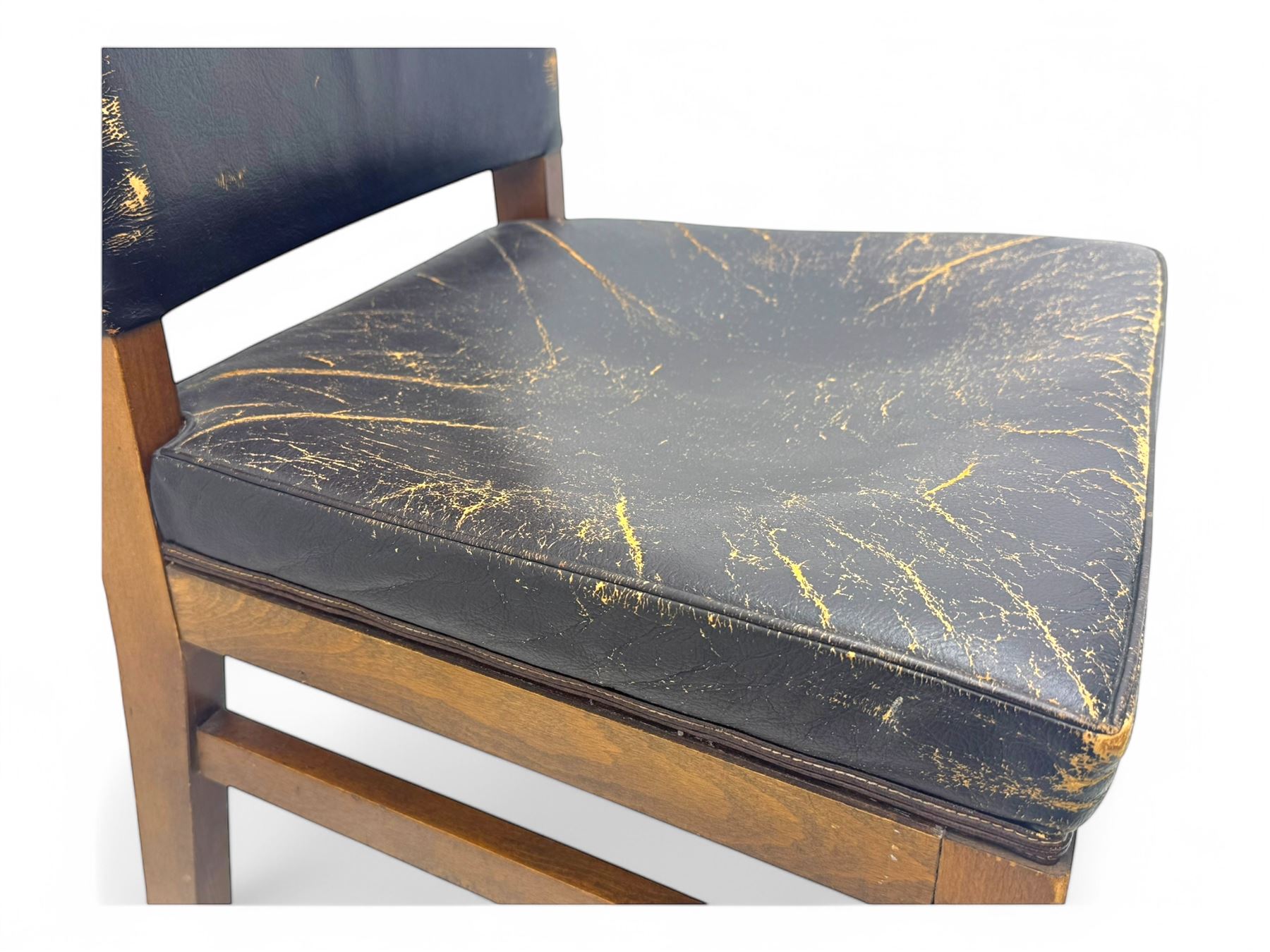 Pair of mid-20th century hardwood chairs associated with the Company of Cutlers in Hallamshire, Sheffield, each featuring a squared frame and black vinyl upholstery, the back emblazoned with the guild’s gilt coat of arms and motto “Pour Y Parvenir a Bonne Foi” (To Succeed through Honest Endeavour)