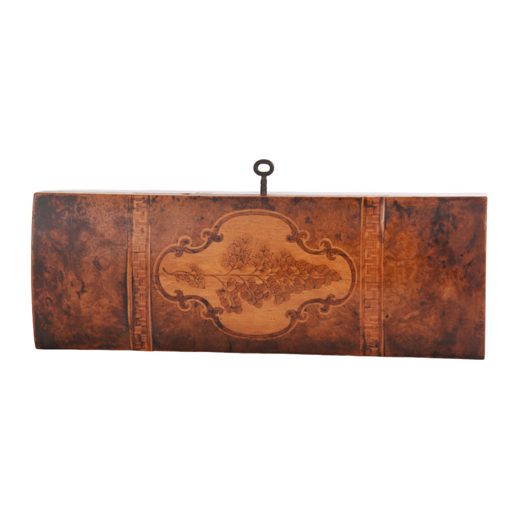 Late 19th century marquetry and parquetry glove box by Anton Seuffert, Auckland, New Zealand, the burr veneer (possibly totara) box of rectangular form, the hinged domed cover detailed with a central shaped cartouche containing a fern, flanked by two cube bands, the interior with paper label detailed 'A. Seuffert Cabinet Maker to His Royal Highness the Duke of Edinburgh Elliot St. Auckland New Zealand', H7.5cm L29cm D10cm, with accompanying key believed to be original 
This item has been registered for sale under Section 10 of the APHA Ivory Act