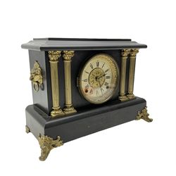 Seth Thomas - American late 19th century 8-day  mantle clock in a wooden case striking the hours on a gong and the half hours on a bell. With pendulum and key. 