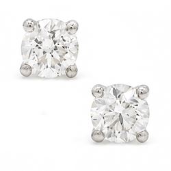 Pair of platinum diamond earrings, each stud set with a single round brilliant cut diamond, stamped PT 950total diamond weight approx 1.05 carat