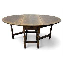 19th century oak dining table, oval drop-leaf top on gate-leg action base, turned supports united by turned stretchers, fitted with single end drawer