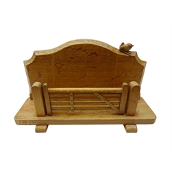  'Wrenman' oak letter rack, with five bar gate, the shaped back with carved wren signature, on sledge supports, by Robert Hunter of Thirlby, Thirsk (ex Mouseman), H37cm, W33cm  