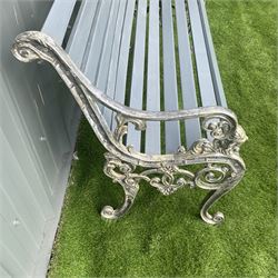 Cast aluminium bench with lions head arms and painted wooden slats