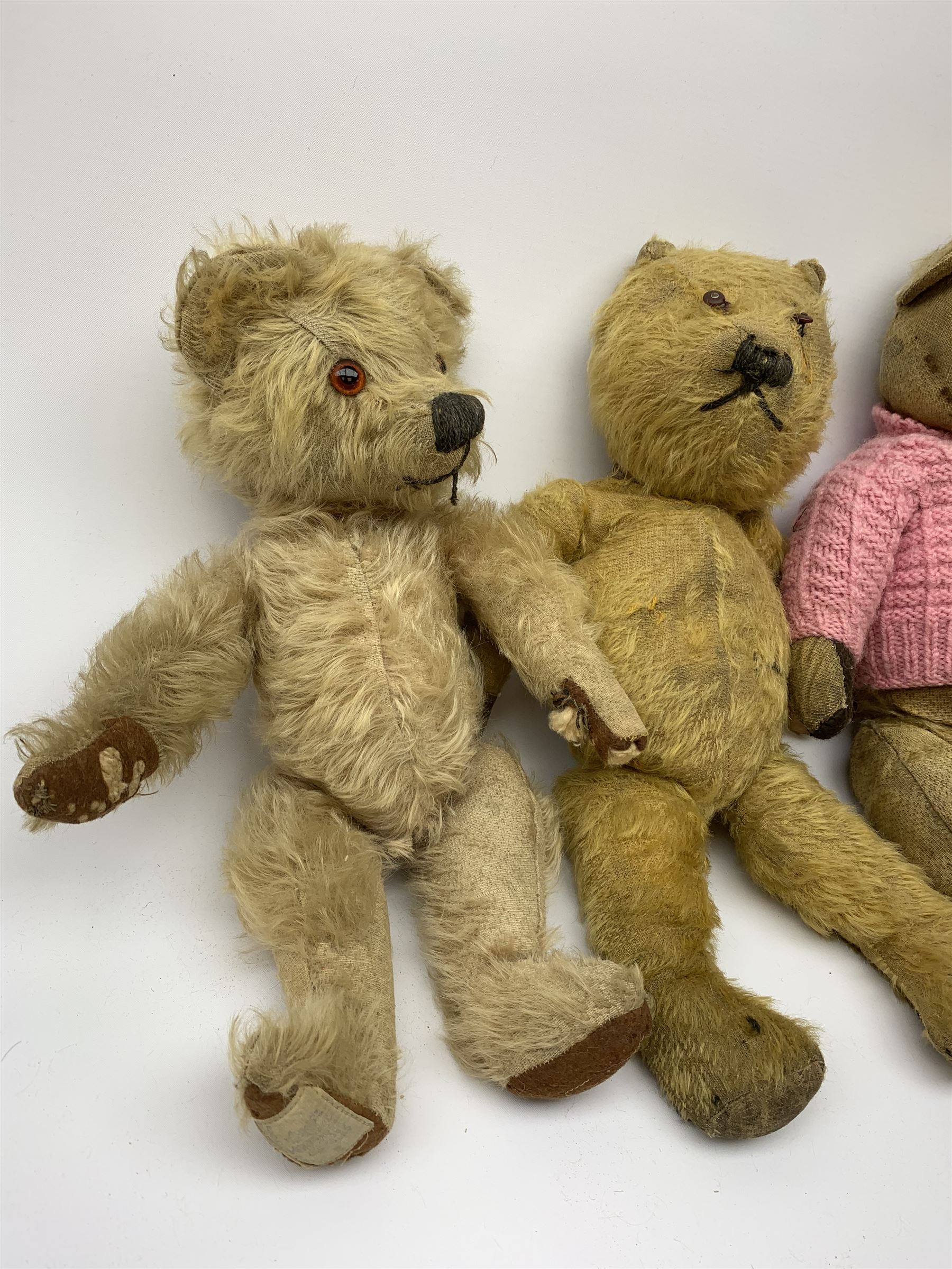 Five English teddy bears 1930s-50s including Chad Valley with swivel jointed head, glass type eyes and vertically stitched nose and mouth and jointed limbs with felt paw pads H14