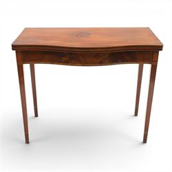 Regency period inlaid mahogany serpentine-fronted fold-over tea table, the shaped rectangu...