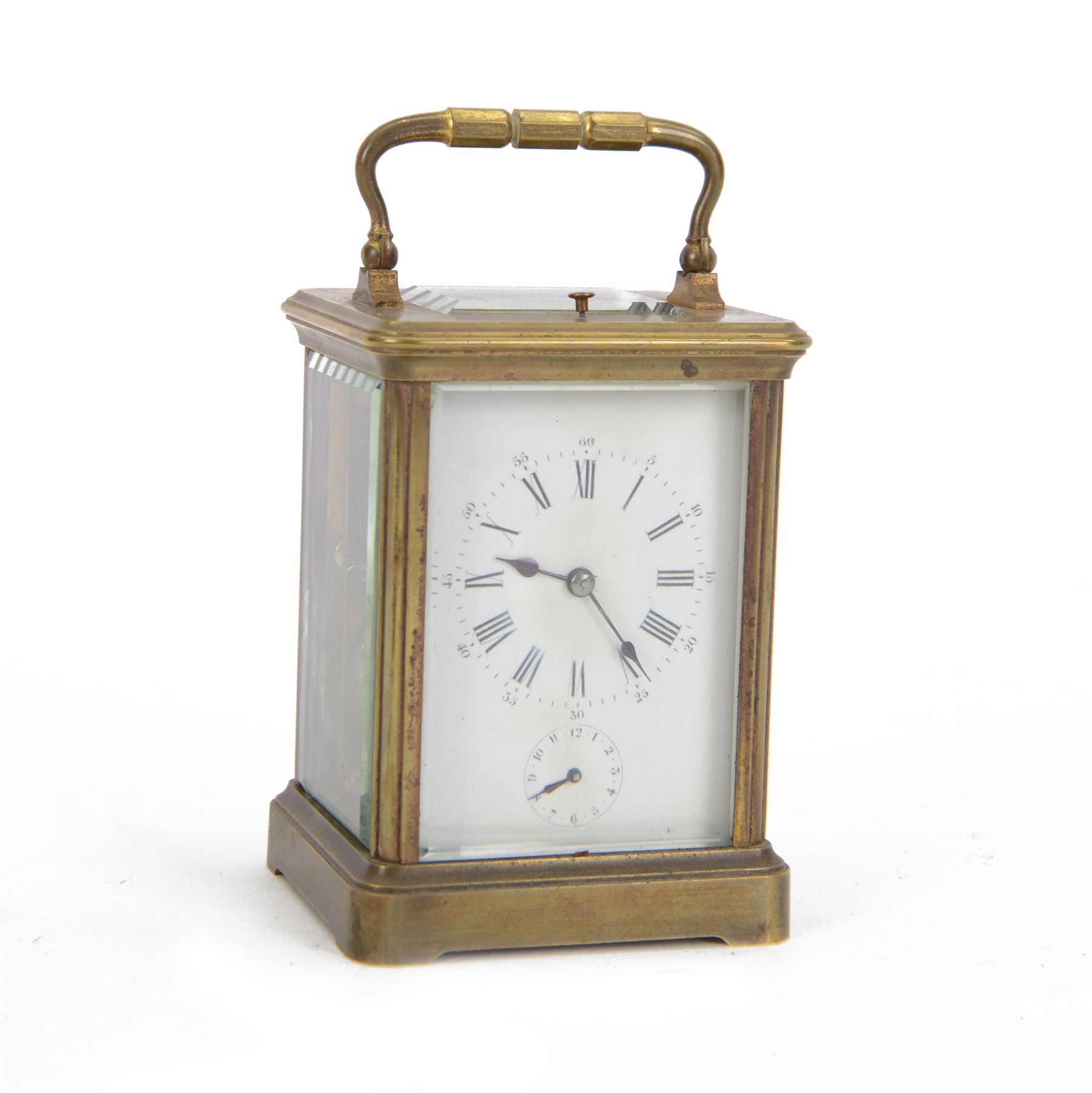 French-19th century 8-day carriage clock in a corniche case, two train striking movement with repeat work and alarm, enamel dial with Roman numerals and five minute Arabic’s, spade hands and alarm setting dial, movement with a lever platform escapement sounding the hours and alarm on a gong. With original case and key.