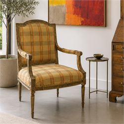 Louis XVI style painted fauteuil armchair, the shaped padded back and overstuffed seat uph...
