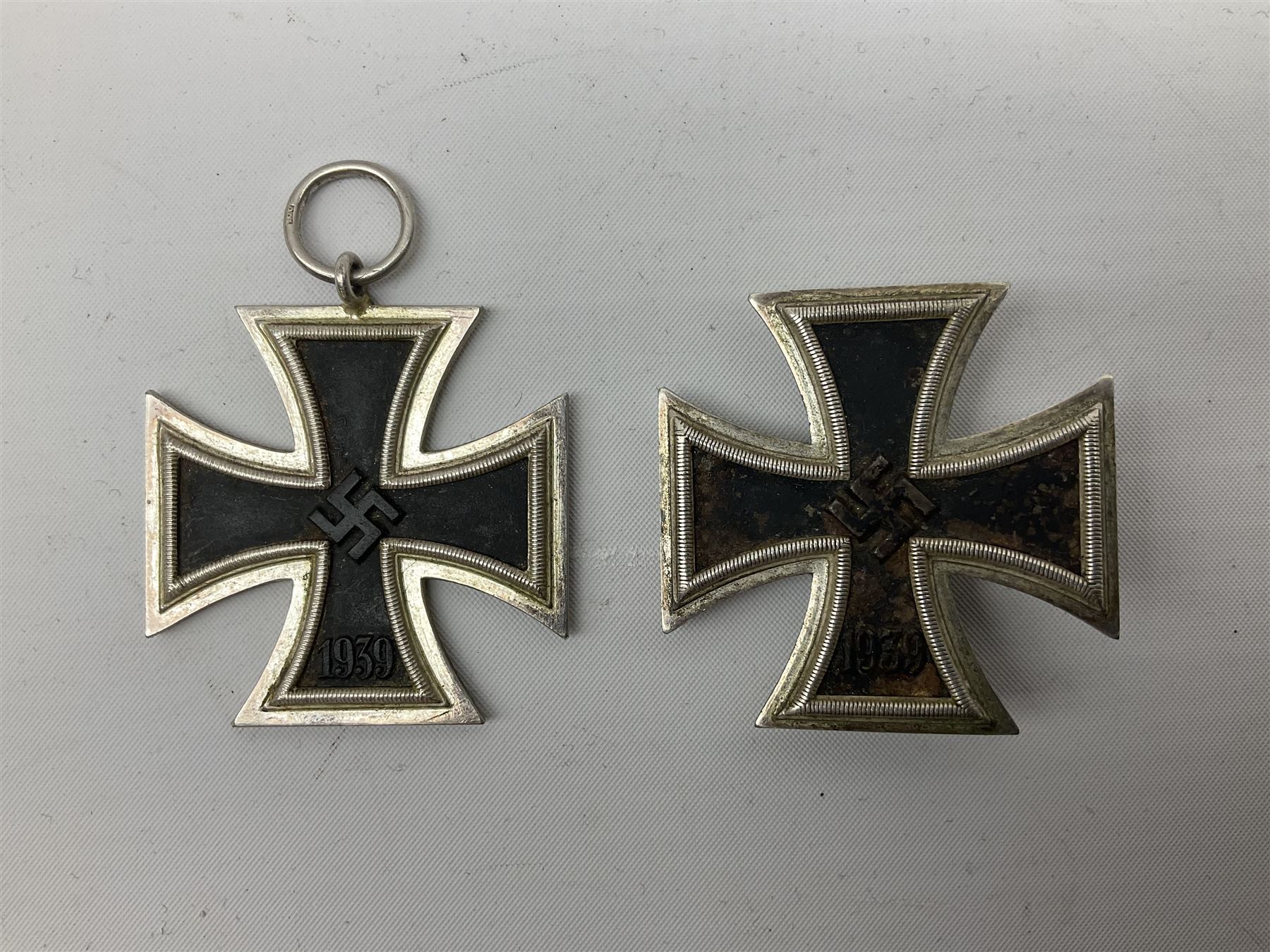 WW2 German Iron Cross 1st Class, back of pin indistinctly stamped ?20; and WW2 German Iron Cross 2nd Class, ring indistinctly stamped ?100 for Rudolf Wachtler und Lange (2)