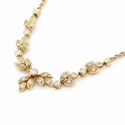 18ct gold diamond floral design necklace, five round brilliant cut diamonds, each spaced by leaf design links set with diamonds, to a Spiga link chain, Sheffield import mark 1989, total diamond weight approx 0.75 carat