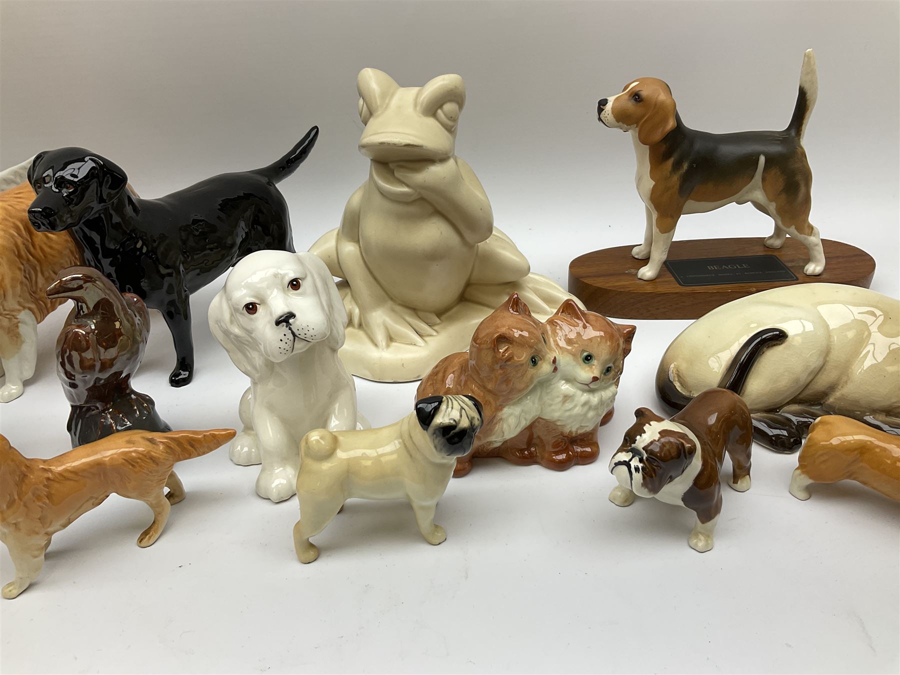 Beswick figures to include, english setter 'Bayldone Baronet', model no 973, collie, model no 1791, sheepdog, model no 1792, black labrador, model no 1548, Irish red setter, model no 966, Connoisseur Beagle on a wooden plinth 1933B, frog in cream matt, model no 368, etc 