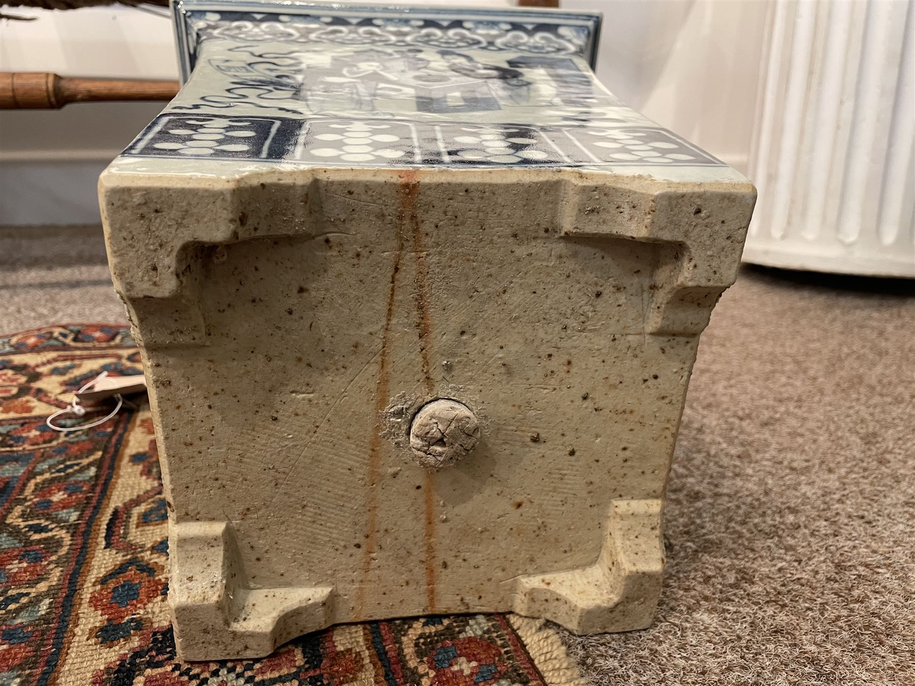 19th century Chinese blue and white planter and stand, each of square slightly tapering and flared form, the planter decorated with figures and precious objects between stylised foliate borders, the stand decorated with landscapes beneath a lipped rim with cell band, planter H28cm D25.5cm, stand H7cm D26cm