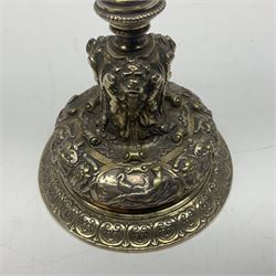 Pair of Victorian Elkington Mason & Co silver plated candlesticks, decorated in relief with ram masks and figures, H14cm
