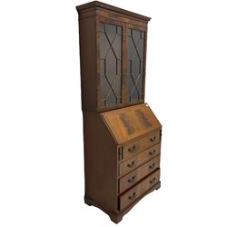 Reproduction mahogany bureau bookcase, the glazed bookcase over fall front bureau fitted with four drawers, on bracket feet