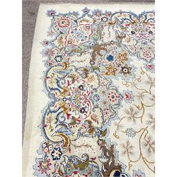 Large Persian Sarouk ivory ground carpet, central rosette medallion with a series of plant motifs, the field decorated with interlacing and hanging cartouches, surrounded by shaped border with stylised plant and flower head motif decoration 