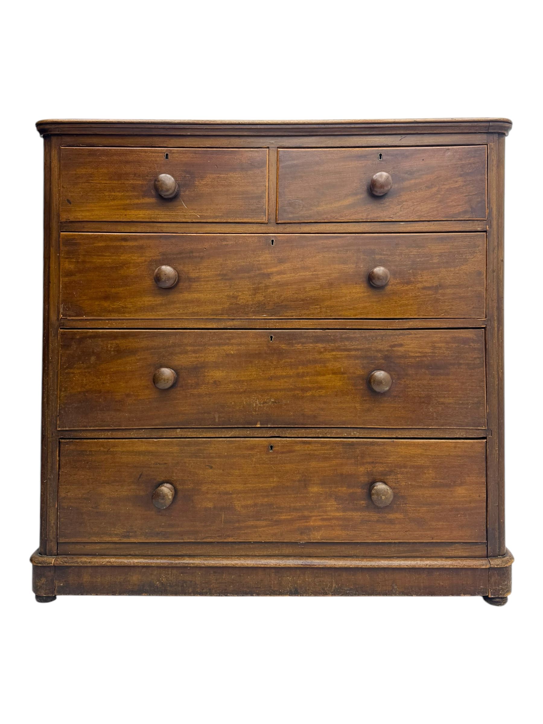 19th century mahogany chest of drawers, rectangular top over two short and three long graduated cockbeaded drawers, raised on compressed bun feet