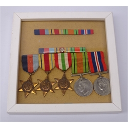  Five WW2 medals comprising 1939-45 medal, Defence Medal, Africa Star, Italy Star and 1939-45 Star, displayed in modern frame with two medal bars  