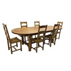 Oak extending dining table, with two additional leaves, together with set six ladder back dining chairs with rush seats