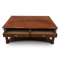 Georgian style mahogany coffee table, rectangular moulded top with crossbanded border and line inlay, fitted with two cock-beaded frieze drawers with ornate brass swan neck handles and shaped backplates, opposing false drawer fronts, raised on square tapering supports united by a concave undertier