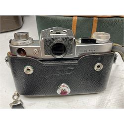 Miranda Sensorex camera body, Miranda Sensorex II camera body with 'Auto Miranda 1:1.8 f-59mm' lens, 'Auto Miranda 1:2.8 f-135mm' lens, 'Auto Miranda 1:3.5 f-200mm' lens, 'Auto Miranda 1:2.8 f-28mm' len, Agfa plate camera with 9cm x 12cm plates and other camera equipment including Miranda camera bag